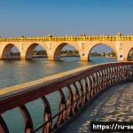 세네갈에서 가장 오래된 도시 - **"A picturesque, photorealistic scene of the historic island of Saint-Louis, Senegal, at golden hou...